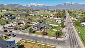 Aerial view of residential area featuring mountains