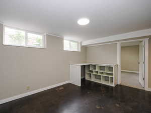 Basement featuring baseboards