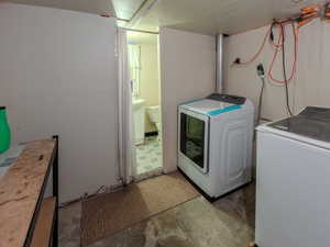 Washroom featuring separate washer and dryer