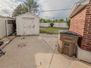 RV Parking, and view of the storage shed, and an outdoor structure.