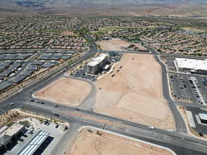 Aerial view of property's location featuring mountains