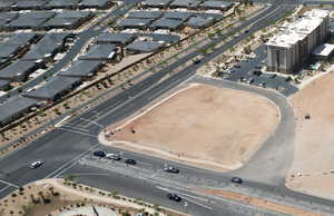 View of property location with nearby suburban area