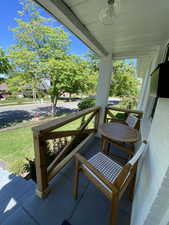 Balcony featuring covered porch