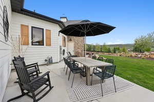 View of patio with outdoor dining space