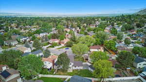 Aerial overview of property's location featuring nearby suburban area
