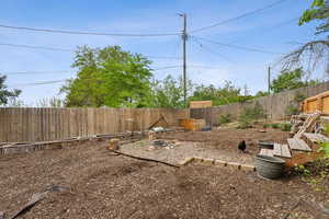 View of fenced backyard