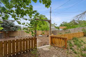 View of fenced backyard