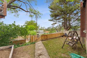 View of yard with a gate