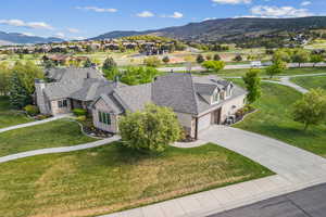 Aerial view of residential area featuring mountains
