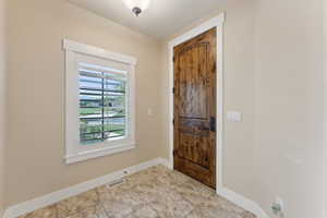 Entryway featuring baseboards