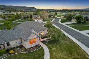 Aerial view at dusk of a mountain view and a residential view