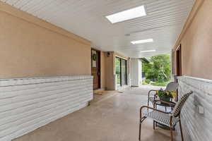 View of exterior entryway and patio