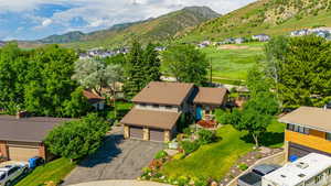 Aerial view of residential area with a mountainous background