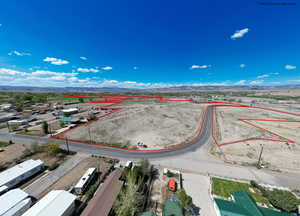 Aerial view of property's location with mountains and property boundaries highlighted