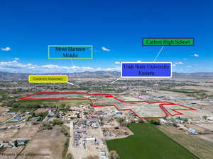 Aerial overview of property's location featuring mountains and property boundaries highlighted