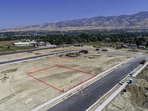 View of property location with property boundaries highlighted and a mountain backdrop