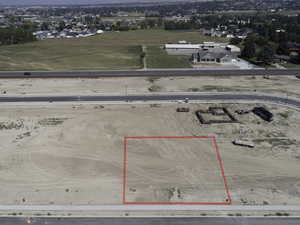 Aerial overview of property's location with property parcel outlined