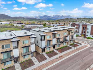 View of building exterior featuring a mountain view