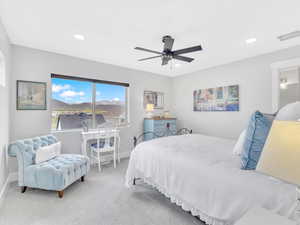 Carpeted bedroom featuring recessed lighting, baseboards, and ceiling fan