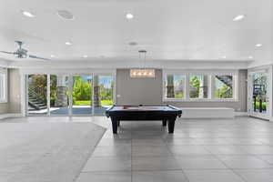 Game room with billiards, light tile patterned floors, and recessed lighting