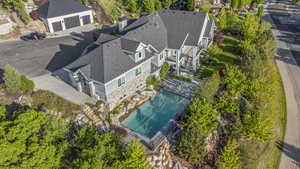 Aerial view of residential area featuring a pool area