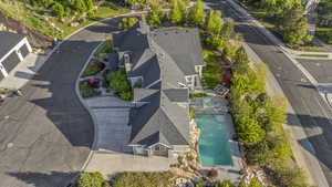 View of subject property with a pool