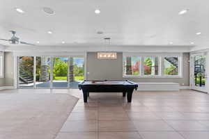 Playroom with recessed lighting, billiards, light tile patterned flooring, and baseboards