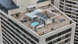 View of rooftop with hot tub and barbecue from above the North Tower