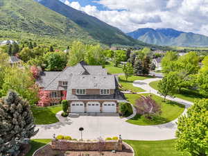 View of subject property featuring a mountainous background