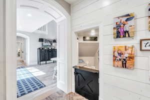 Bar with arched walkways and baseboards