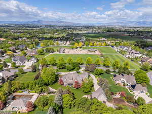 Aerial perspective of suburban area featuring a mountain backdrop