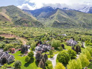 Aerial view of residential area featuring mountains