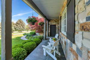 View of patio featuring a porch
