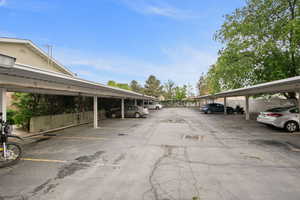 Covered parking lot with fence