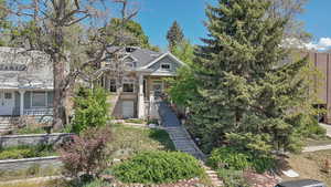 View of front of property featuring stairs