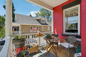Balcony featuring covered porch