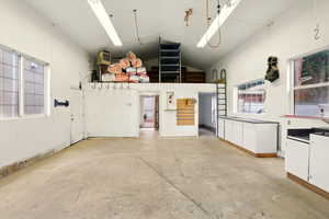 Detached workshop / garage with workbenches and loft storage