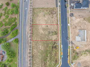 Aerial overview of property's location with property parcel outlined