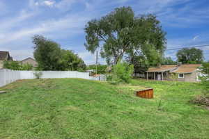 View of yard featuring a storage shed