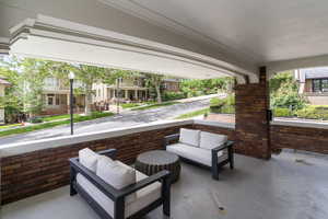 View of patio featuring a porch and a residential view
