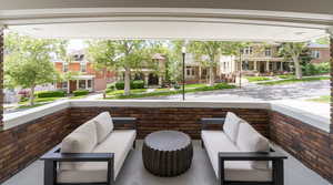 View of patio / terrace with an outdoor living space and a residential view
