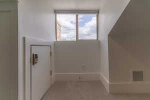 Interior space featuring carpet