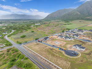 Aerial view of residential area featuring mountains
