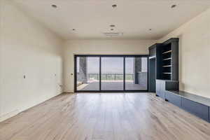 Level 2 living area with bar and access to deck