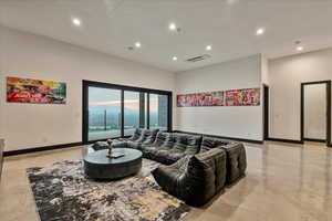 Basement walk out living/entertaining area off of pool