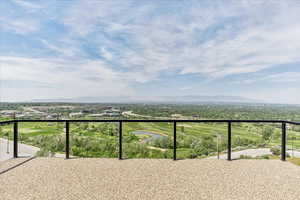 Second level deck with mountain and golf course view