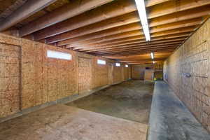 Horse boarding area in barn.