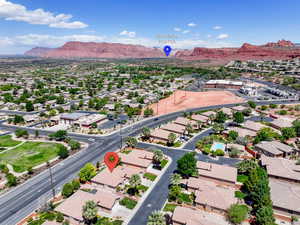 Aerial view of residential area featuring a mountain backdrop
