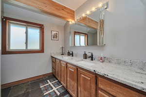 Full bathroom with double vanity