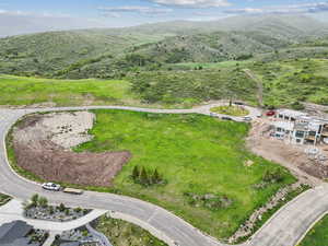 Secluded cul-de-sac lot offering panoramic views, year-round access, and the perfect setting for your custom mountain retreat.